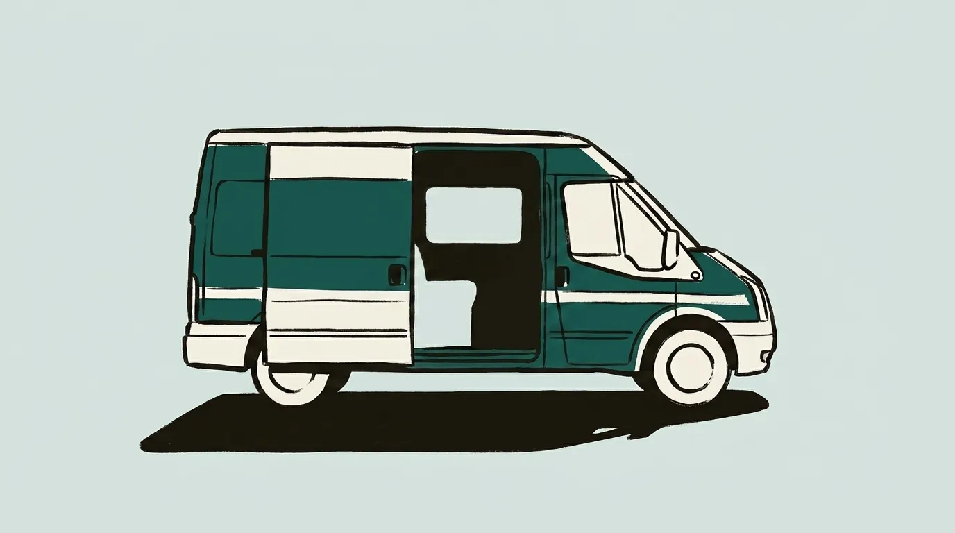 The outreach van at night with its side door open and interior lit